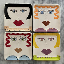 Load image into Gallery viewer, four dessert sized plates - variety of women&#39;s faces - redhead with green eyes and blue dress/ black hair with blue eyes and a tan polka dot top/ orange hair with blue eyes and purple dress/blonde with brown eyes and green top
